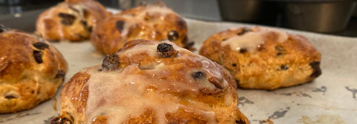 close of up scones with icing drizzled on top